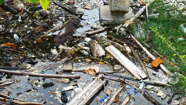 Water pollution problem Garbage floating in the river the problem is caused by humans, leaving in spite of water, causing environmental problems, polluted wastewater, and to destroy the ecological .