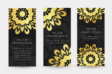 Golden floral motif. Luxury vertical flayers with ornaments on the black background.