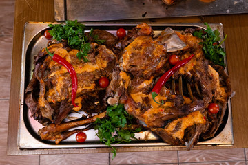 baked meat on a metal tray