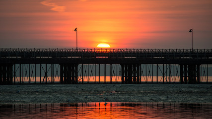 Fototapeta na wymiar Isle of Wight serene sunset with Ryde pier detail