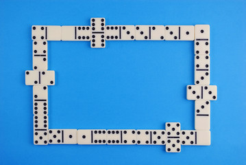 dominoes on blue background.