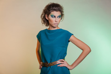Bold image of a modern woman predator. Bright makeup women vamp.