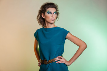 Bold image of a modern woman predator. Bright makeup women vamp.