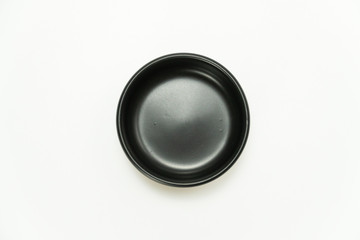 Top view of black circle ceramic bowl isolated on white background