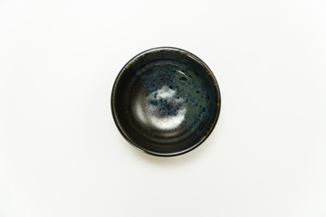 Top view circle ceramic bowl with indigo blue pattern isolated on white background