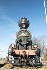 Kouvola, Finland - April 18, 2019: Old steam locomotive as an exhibit at the Kouvola railway...