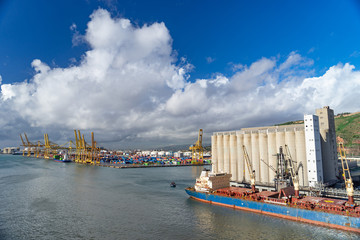 Panoramic view of the port in Barcelona with containers and cranes