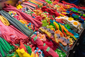 Various colorful candies and jellies in the marketplace