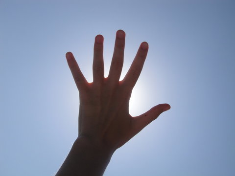 Hand Covering Sun