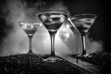Selection of alcoholic drinks on rustic wood background. Creative artwork decoration