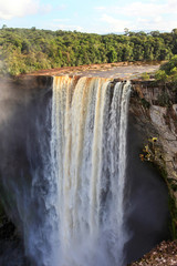 A view of the Kaieteur falls, Guyana. The waterfall is one of the most beautiful and majestic waterfalls in the world, the water of the Potaro river falls from a height of 221 meters. World tourism.