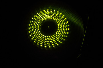 Concept of speed - Trail of fire and smoke - Vinyl record. Burning vinyl disk. Turntable vinyl record player. Retro audio equipment for disc jockey. Sound technology