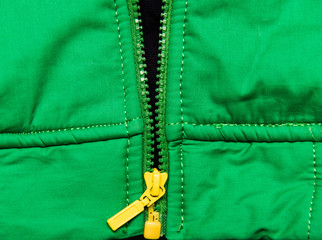 zipper on green jacket