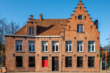 Facade of a house in the city of Bruges in Belgium