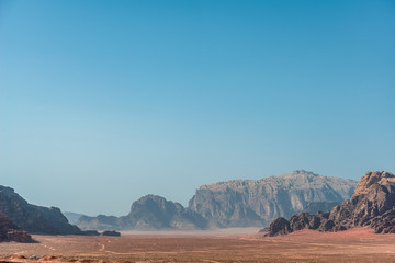 amazing view in incredible lunar landscape in Wadi Rum village in the Jordanian red sand desert....