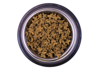 Dry cat food in a bowl. Pet food isolated on white background. Top view