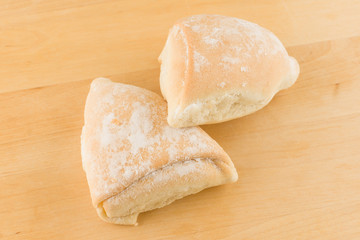 fresh pastry on a wooden tray
