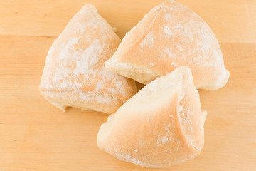 fresh pastry on a wooden tray