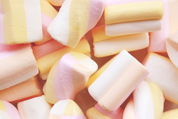 Background of pastel colours marshmallows