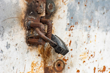 Rusty metal gate closed lock