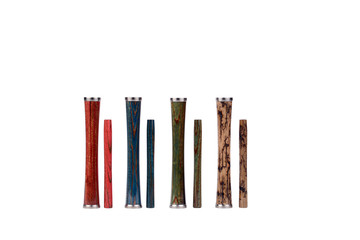 Wooden red, blue, green and brown, beige with burned-out elements of lightning hookah stems and mouthpiece details in a vertical position isolated on a white background.