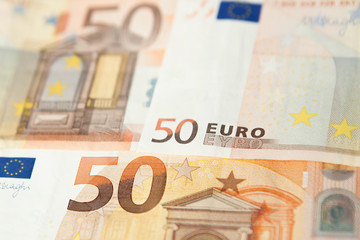 Closeup of a group of fifty euros banknote background