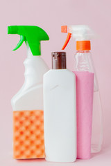 Cleaning accessories in pink color. Cleaning service concept. Flat lay
