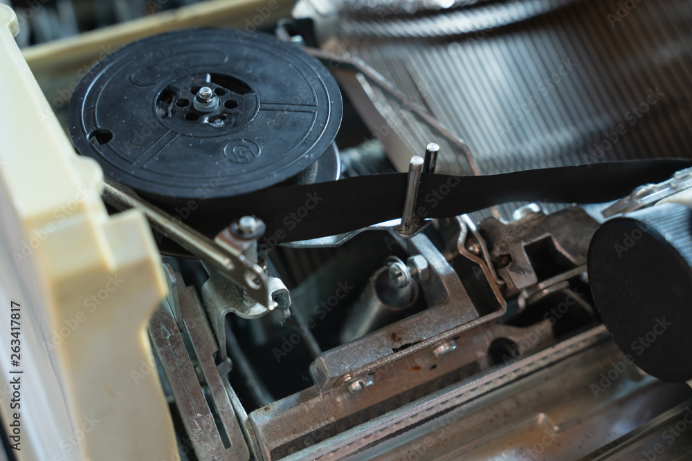 Poster abstract background with metal part and elements of typewriter