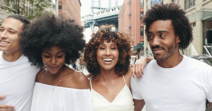 Group of four friends having fun in New york city