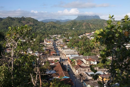 View of the houses of Baracoa, Table Mountain El Yunque behind, Guantanamo province, Cuba, Central America