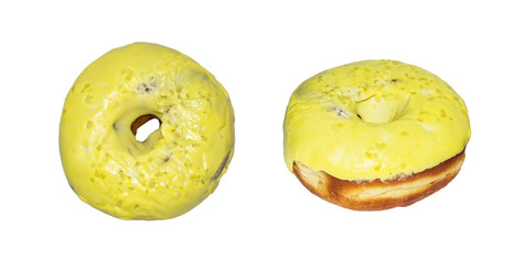 Set of donuts with yellow icing isolated on white background.