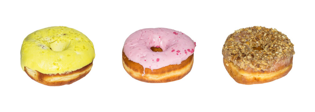 Set of multicolored donuts with icing isolated on white background.