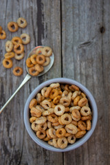 Healthy breakfast cereal rings in bowl. Good morning. A healthy breakfast. Dry muesli.