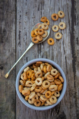 Healthy breakfast cereal rings in bowl. Good morning. A healthy breakfast. Dry muesli.