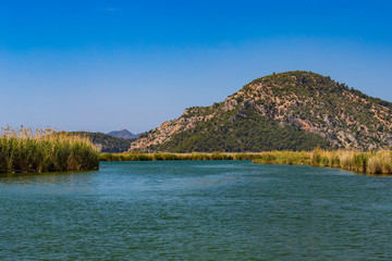 Dalyan River with tourist boats in the straits of the river 