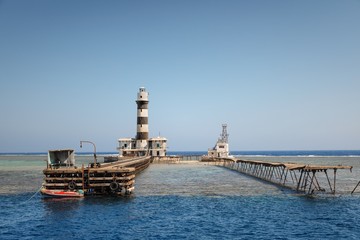 Tall lighthouse on the sea