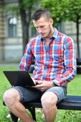 young student man learning on laptop