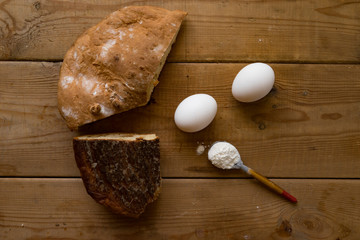 Bread on Wood Background.