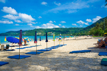 Colorful umbrella on sea bech