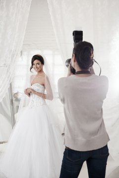 Photographing the bride on wedding-day