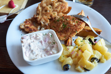 Potatoes with chops and sauce