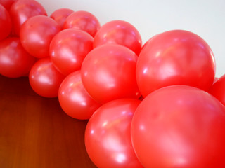 red interconnected balloons