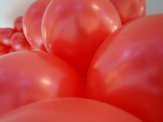 red interconnected balloons