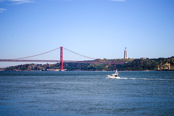 Yatch going to 25th of April Bridge