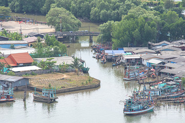 Fishing boats parked in Tha Taphao river access to the sea at Mutsea Mountain Viewpoint in Chumphon , Thailand.