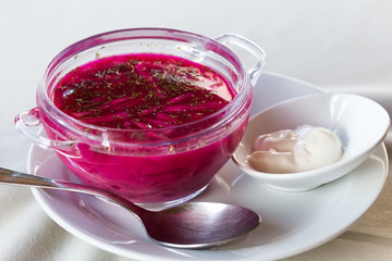 Traditional ukrainian beetroot soup with sour cream