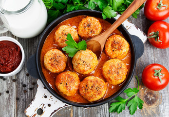 Meatballs in creamy tomato sauce
