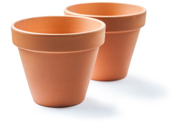 two clay brown pots isolated on white