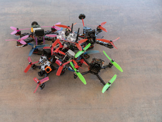 Bunch of racing drones on a table