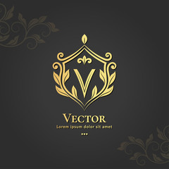 Golden shield emblem. V letter. Elegant, classic vector. Can be used for jewelry, beauty and fashion industry. Great for logo, monogram, invitation, flyer, menu, background, or any desired idea.